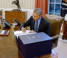 President Obama signing funding legislation