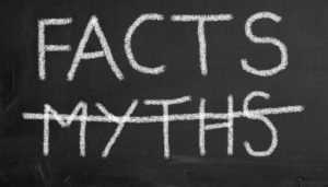 Blackboard with 2 words: Facts and Myths. Myths is crossed out.
